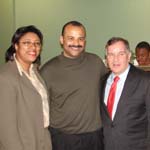 Mayor poses with Alderman Latasha Thomas and BJ's Owner John Meyers