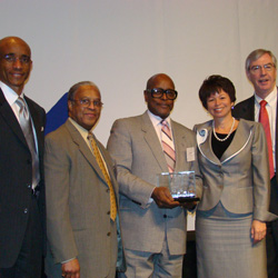 Ceasar Hill (Center) received a Special Recognition Award for St. Leo's Veterans Campus in Auburn Gresham.