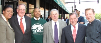 Alderman Latasha Thomas, Jonathan Fanton (MacArthur Foundation), Carlos Nelson (GADC), Andy Mooney (LISC), Mayor Daley and Father Pfleger pose for a photo after Fanton commits $26 million to 14 New Communities Program (NCP) Lead Agencies in Chicago.