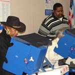 A few seniors take advantage of the early voting opportunities at the library.